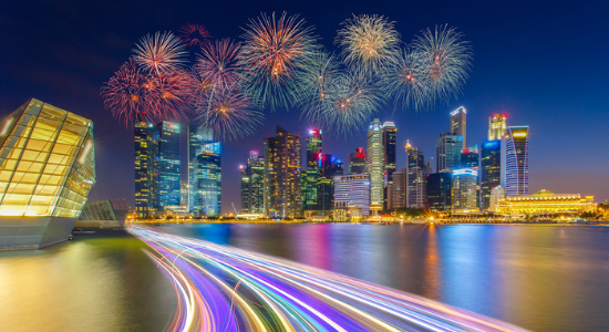 what-spac-means-raw Stock Landscape photo of the Singapore financial district and business buildings in the background. Colourful streaks representing speed of lighting also included.